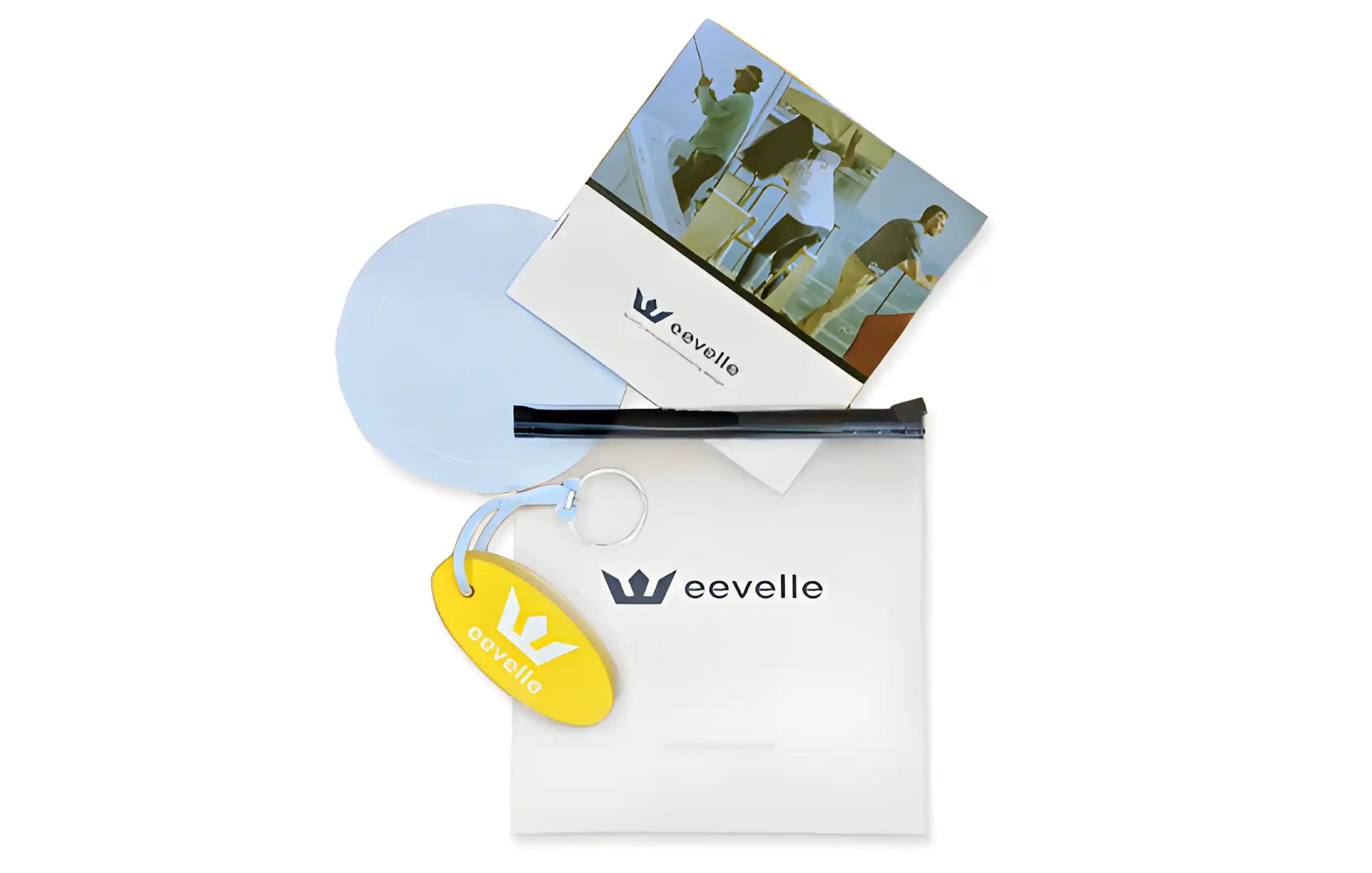 Complementary Eevelle brand kit including keychain, decal and catalog.